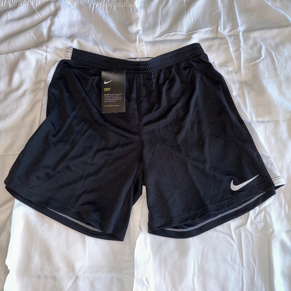 Nike Girl’s Shorts.  Size XL. Black with white stripe. New With Tags.